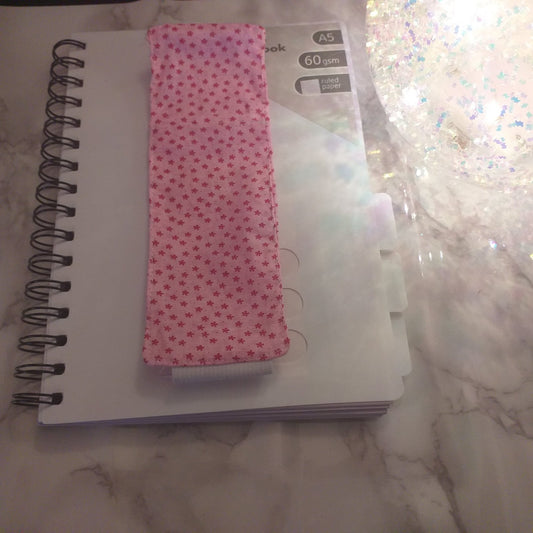 Notebook pen holder